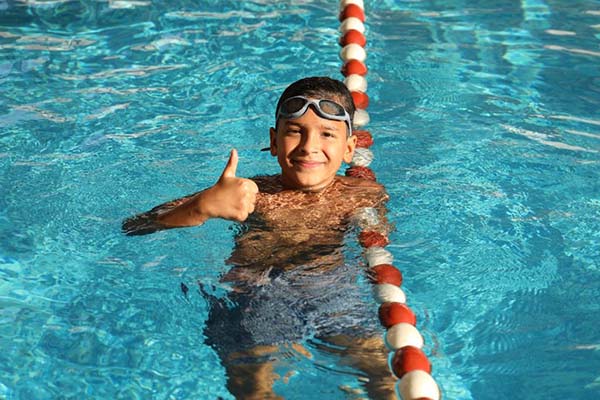 Infinity fitness Ajman - Kids swimming classes
